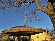 68 Il Sacrario del Monte Tesoro,  mole di cemento sovrastata da alta croce